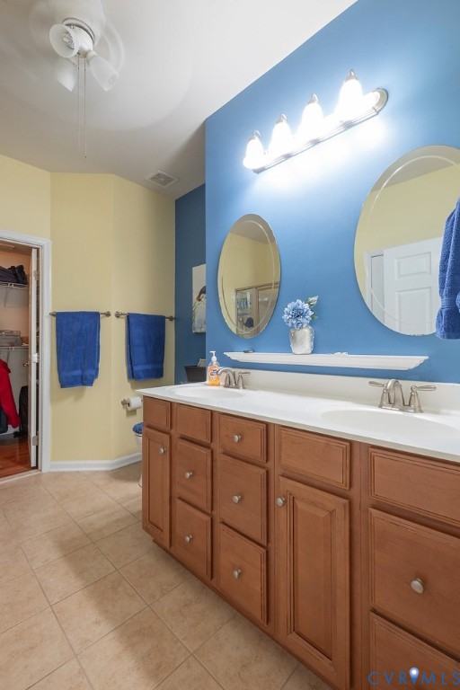 10523 Tea Olive Circle Providence Forge, VA 23140 - Photo 25 of 46 a spacious bathroom with a double vanity sink and a mirror