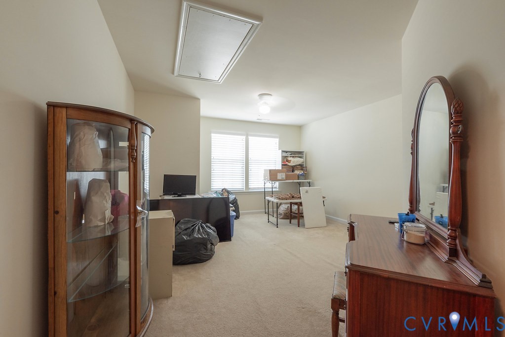 10523 Tea Olive Circle Providence Forge, VA 23140 - Photo 34 of 46 a room with furniture a rug and a window