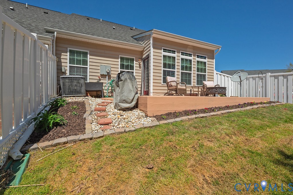 10523 Tea Olive Circle Providence Forge, VA 23140 - Photo 41 of 46 a front view of a house with swimming pool and porch with furniture