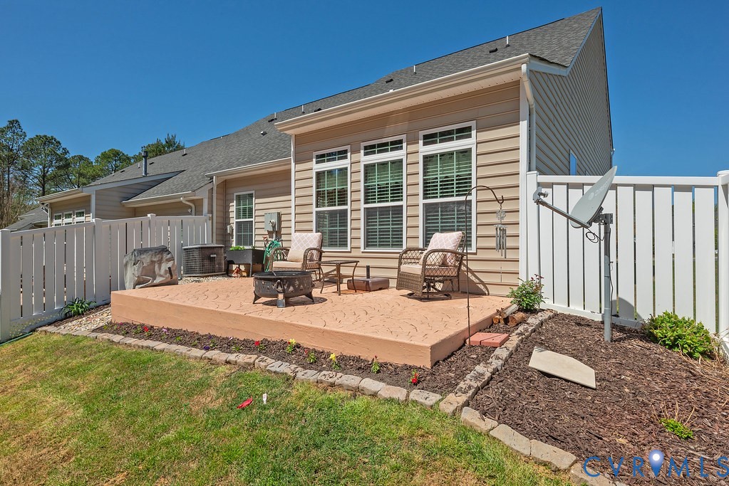 10523 Tea Olive Circle Providence Forge, VA 23140 - Photo 45 of 46 a view of a house with backyard and sitting area