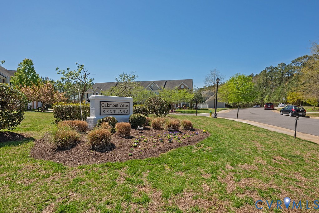 10523 Tea Olive Circle Providence Forge, VA 23140 - Photo 46 of 46 a backyard of a house with table and chairs