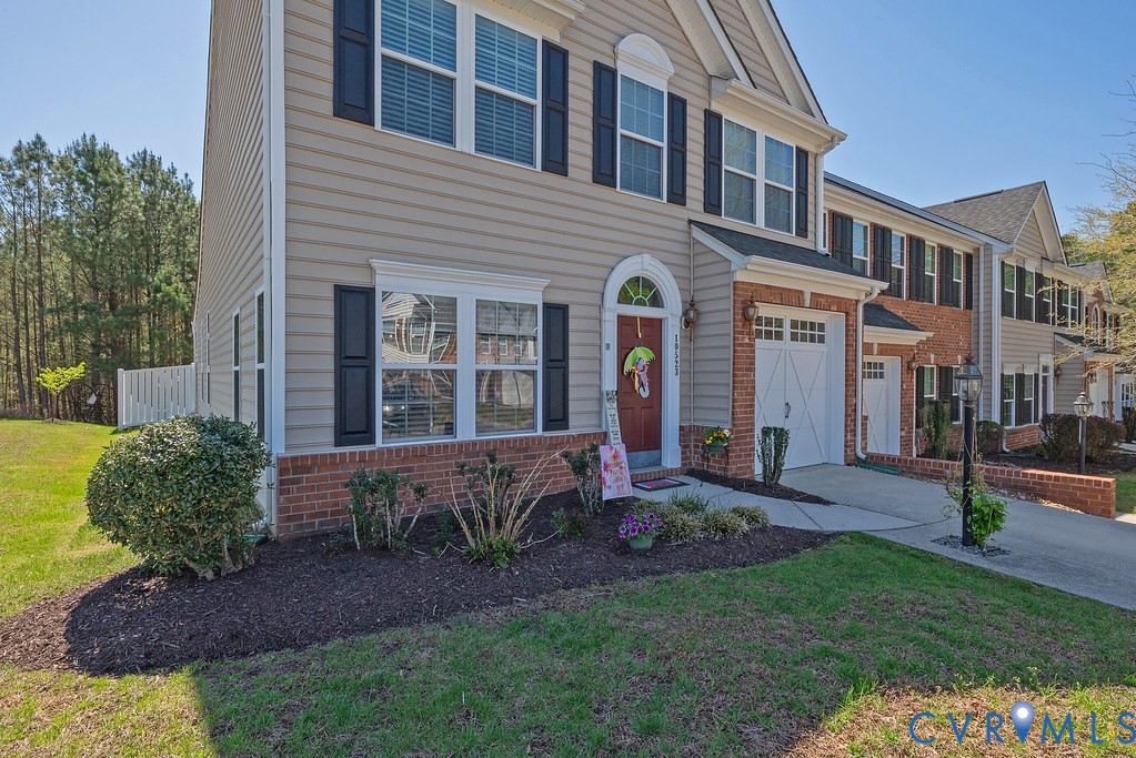 10523 Tea Olive Circle Providence Forge, VA 23140 - Photo 5 of 46 a view of a house with a yard and plants