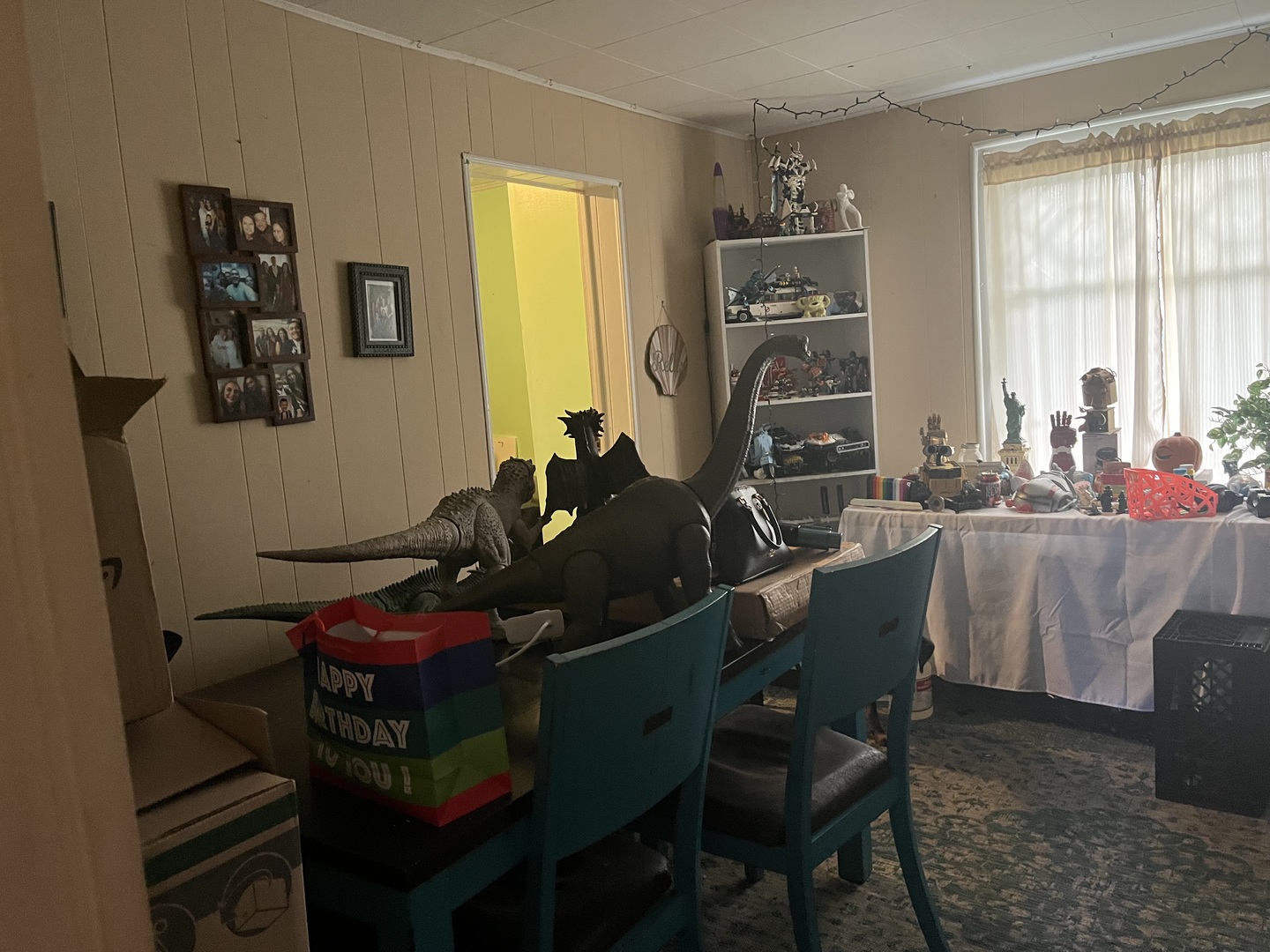 403 South West Street Plano, IL 60545 - Photo 8 of 21 a living room with furniture a window and a chandelier