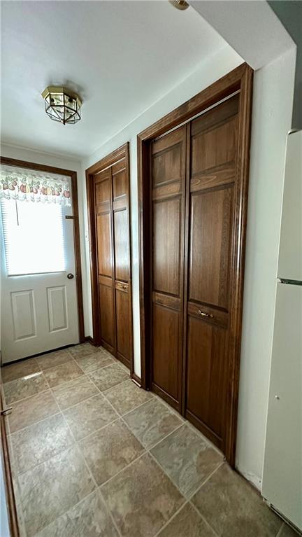820-822 Jacoby Road Harwick, PA 15049 - Photo 23 of 44 820 MAIN PANTRY AND COAT/BROOM CLOSET WITH ENTRY TO REAR DECK.