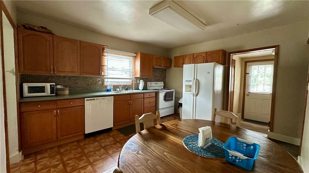 820-822 Jacoby Road Harwick, PA 15049 - Photo 3 of 44 822 MAIN KITCHEN W/PLENTY OF CABINETS! EQUIPPED WITH DW, FRIDGE & RANGE!