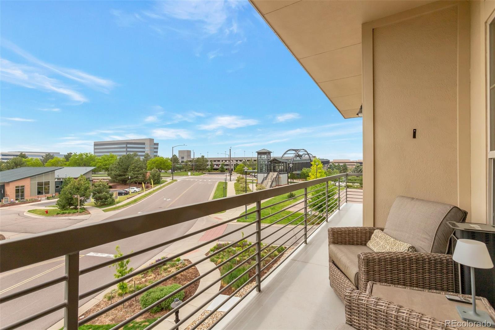 10111 Inverness Main Street, Unit 301 Englewood, CO 80112 - Photo 17 of 28 a view of balcony with furniture