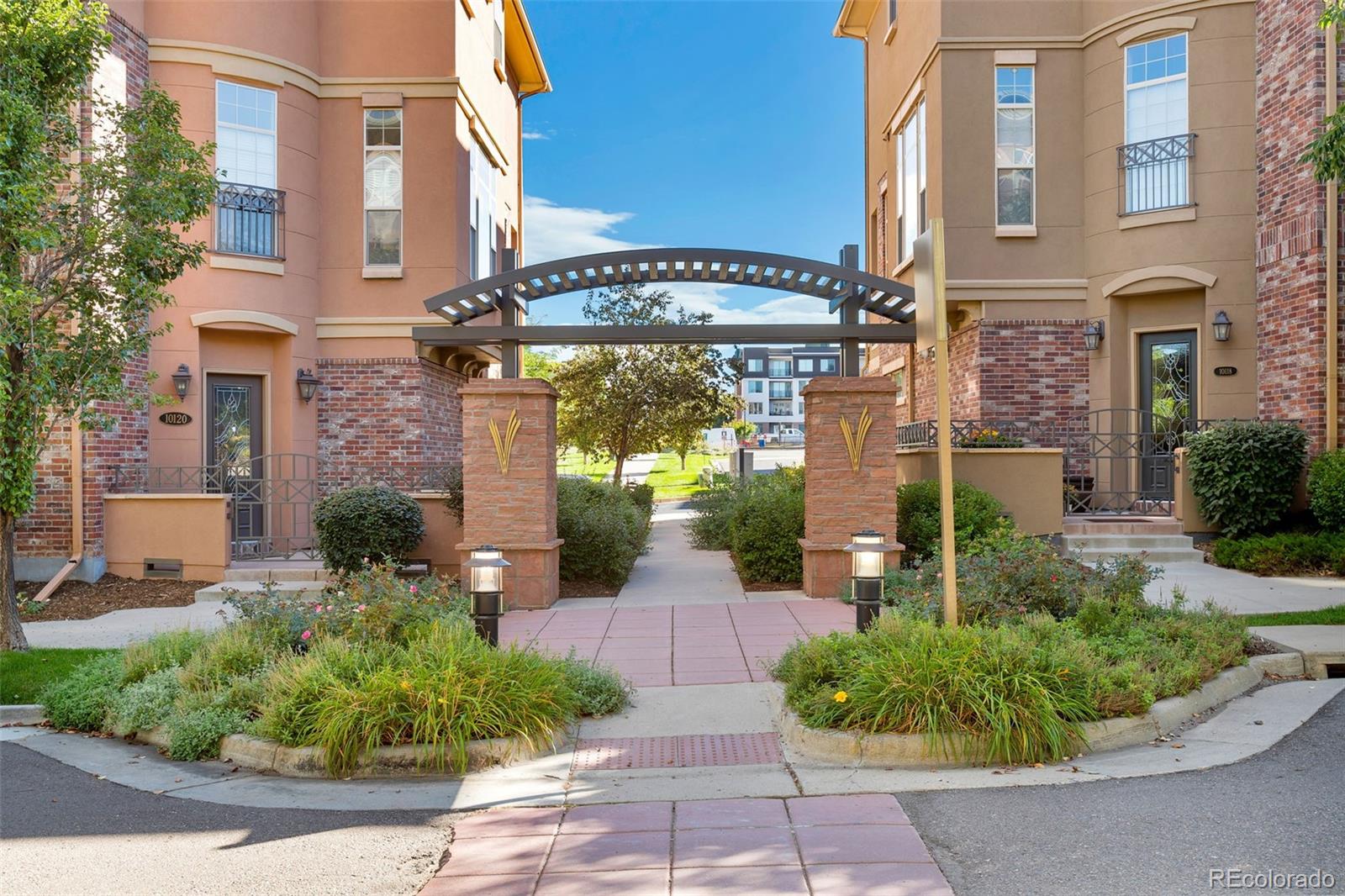 10111 Inverness Main Street, Unit 301 Englewood, CO 80112 - Photo 19 of 28 a view of a building with garden