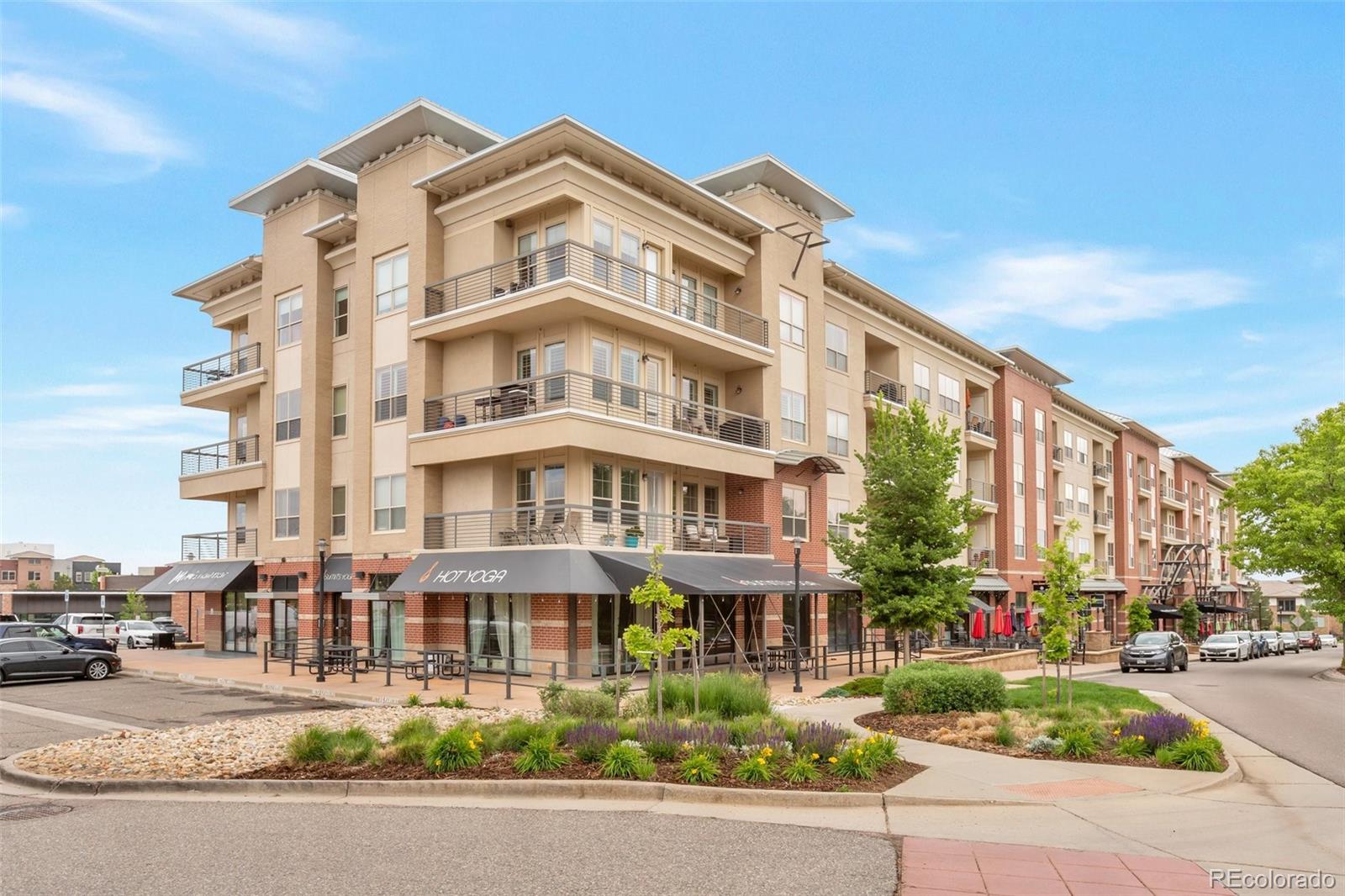 10111 Inverness Main Street, Unit 301 Englewood, CO 80112 - Photo 2 of 28 a front view of a building