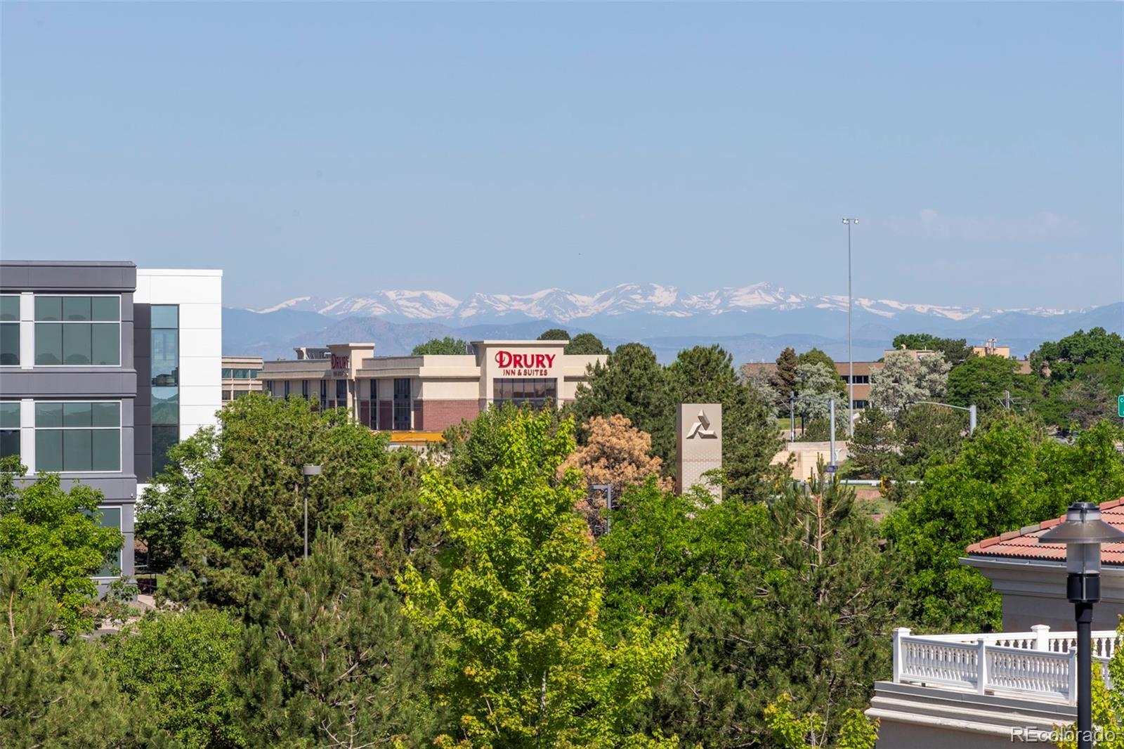 10111 Inverness Main Street, Unit 301 Englewood, CO 80112 - Photo 26 of 28 an aerial view of multiple house