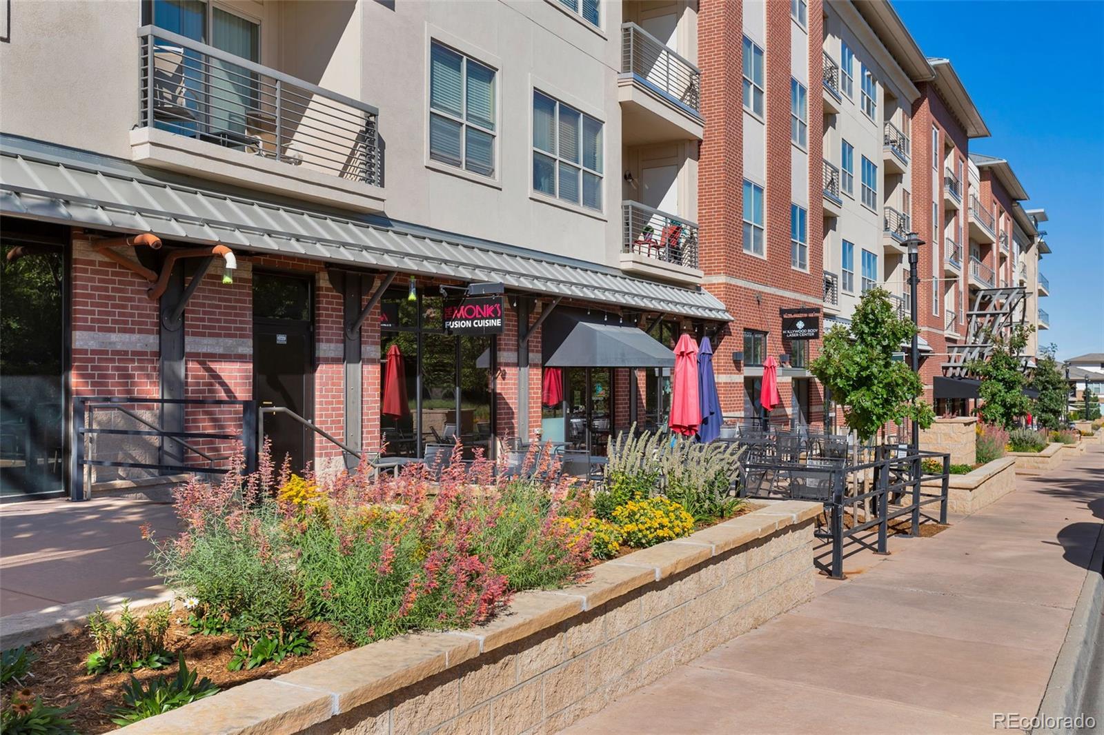 10111 Inverness Main Street, Unit 301 Englewood, CO 80112 - Photo 28 of 28 front view of a building