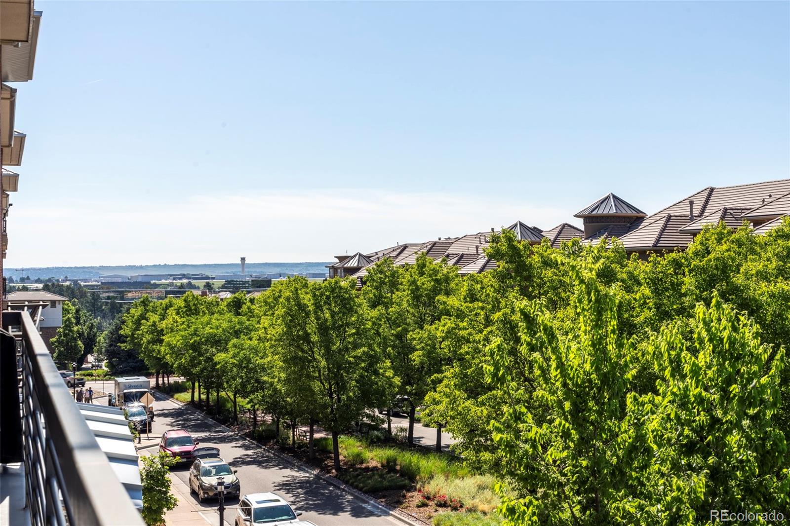 10111 Inverness Main Street, Unit 301 Englewood, CO 80112 - Photo 5 of 28 a view of a lake