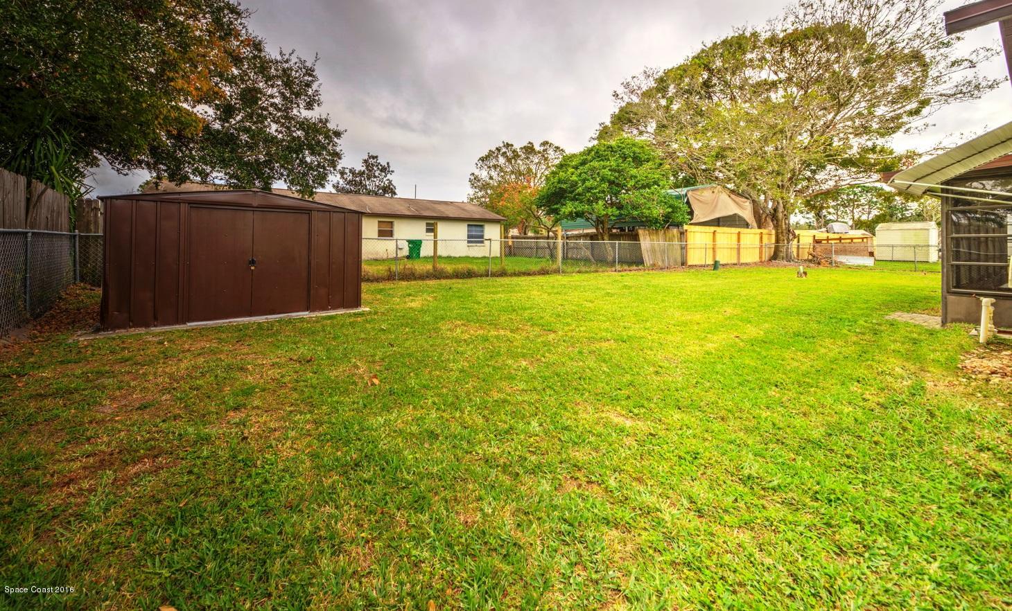 3632 Longbow Road Cocoa, FL 32926 - Photo 5 of 29 B2-Backyard with Storage shed