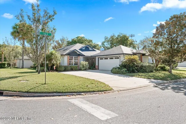 a house with a tree in front of it
