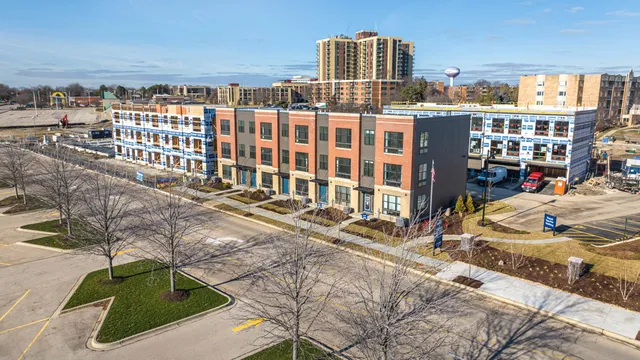 a front view of a building with street view