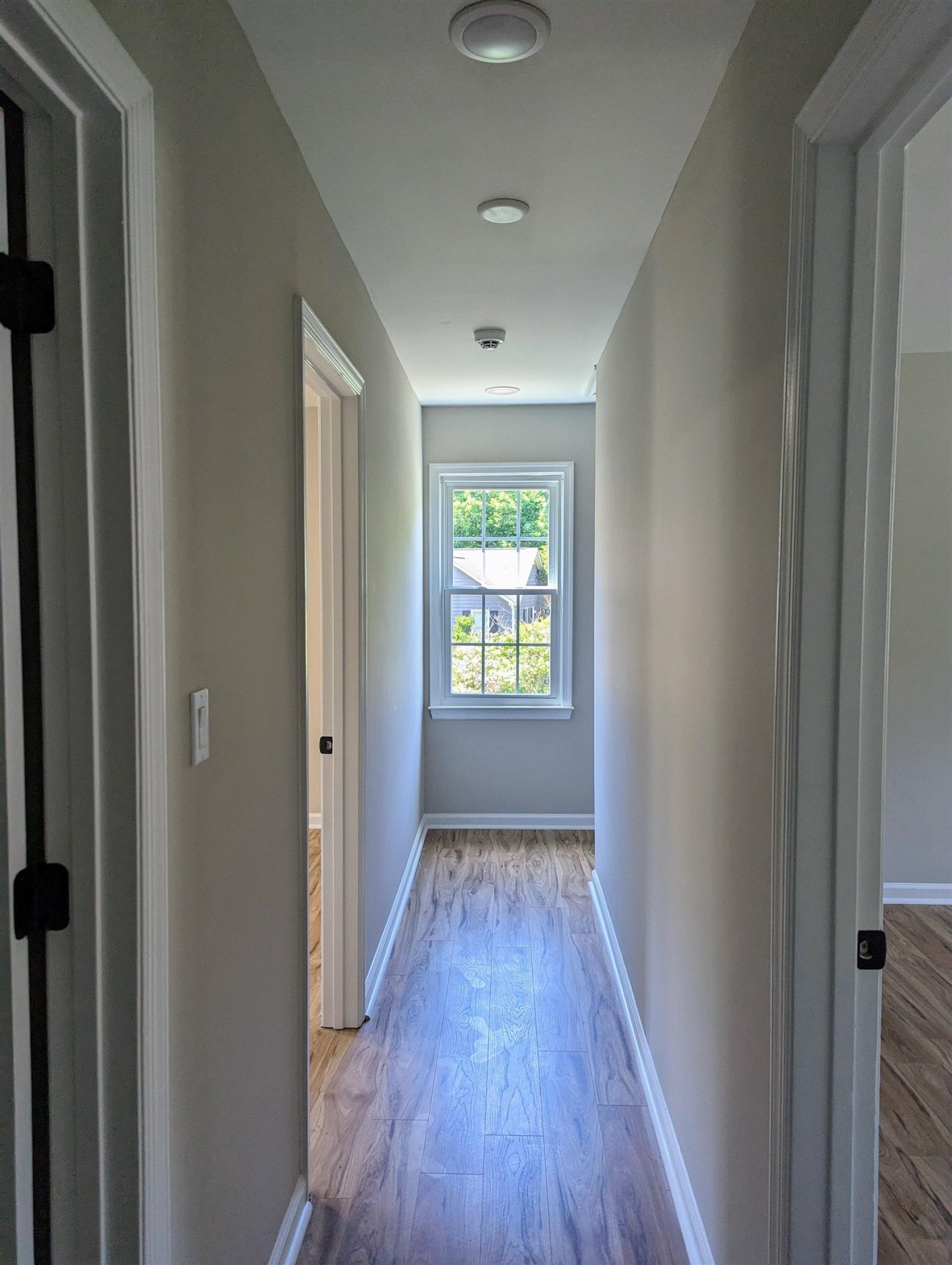 2 Austin Court Durham, NC 27707 - Photo 16 of 29 a view of hallway with wooden floor