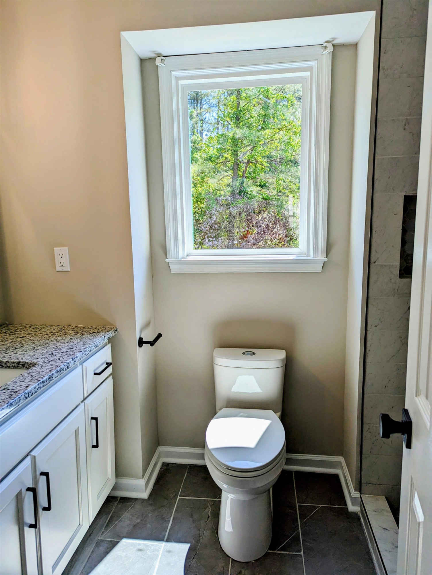 2 Austin Court Durham, NC 27707 - Photo 23 of 29 a white toilet sitting next to a bathroom sink