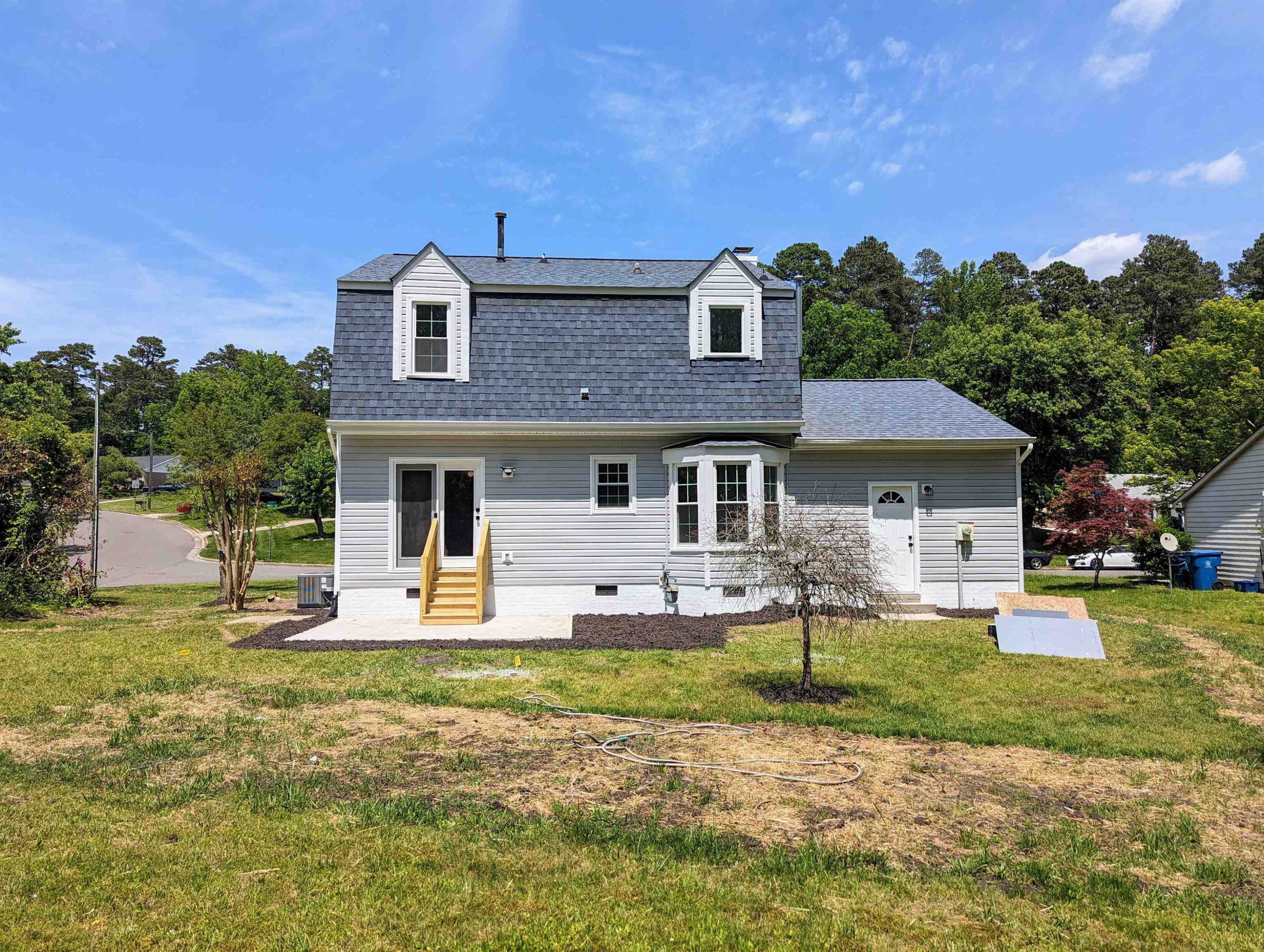 2 Austin Court Durham, NC 27707 - Photo 27 of 29 a front view of a house with a yard