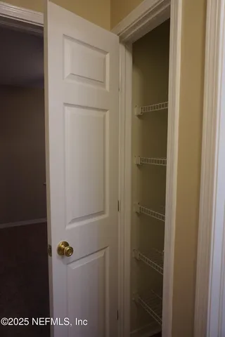 a bathroom with a glass door shower