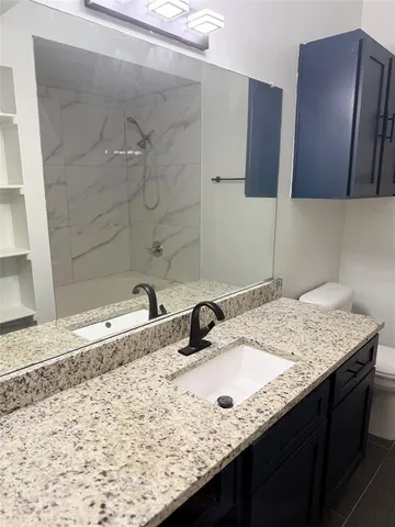a bathroom with a bath tub
