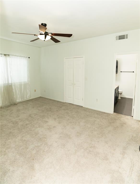 2601 Preston Road, Unit 7203 Plano, TX 75093 - Photo 22 of 27 an empty room with a window