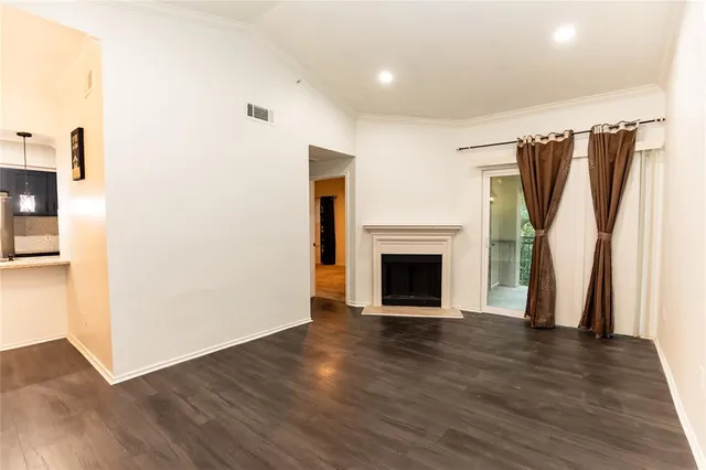 a view of front door with wooden floor