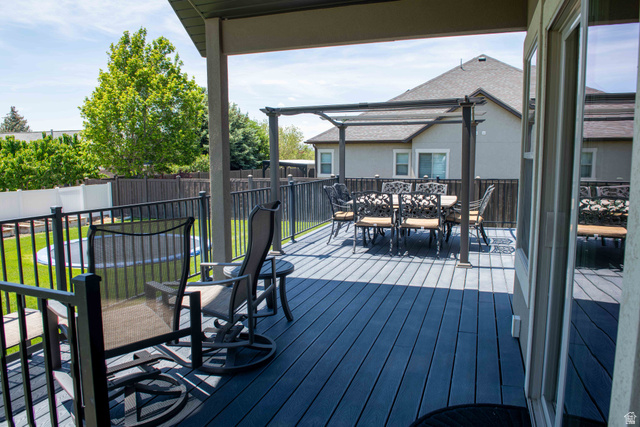 646 East 1400th Street North Mapleton, UT 84664 - Photo 70 of 78 Expansive outdoor deck featuring dark gray composite decking and black metal railings