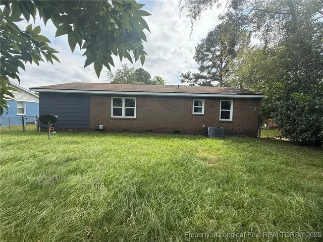 front view of house with a yard