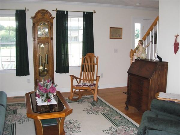 120 Rice Corner Road Brookfield, MA 01506 - Photo 5 of 28 a living room with furniture and wooden floor