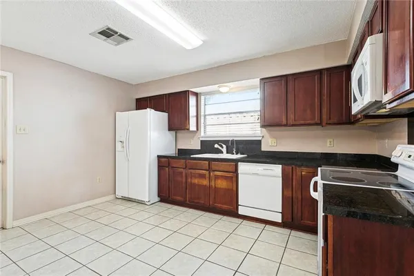 $334,900 | 717 Park Ridge Drive, River Ridge, LA 70123