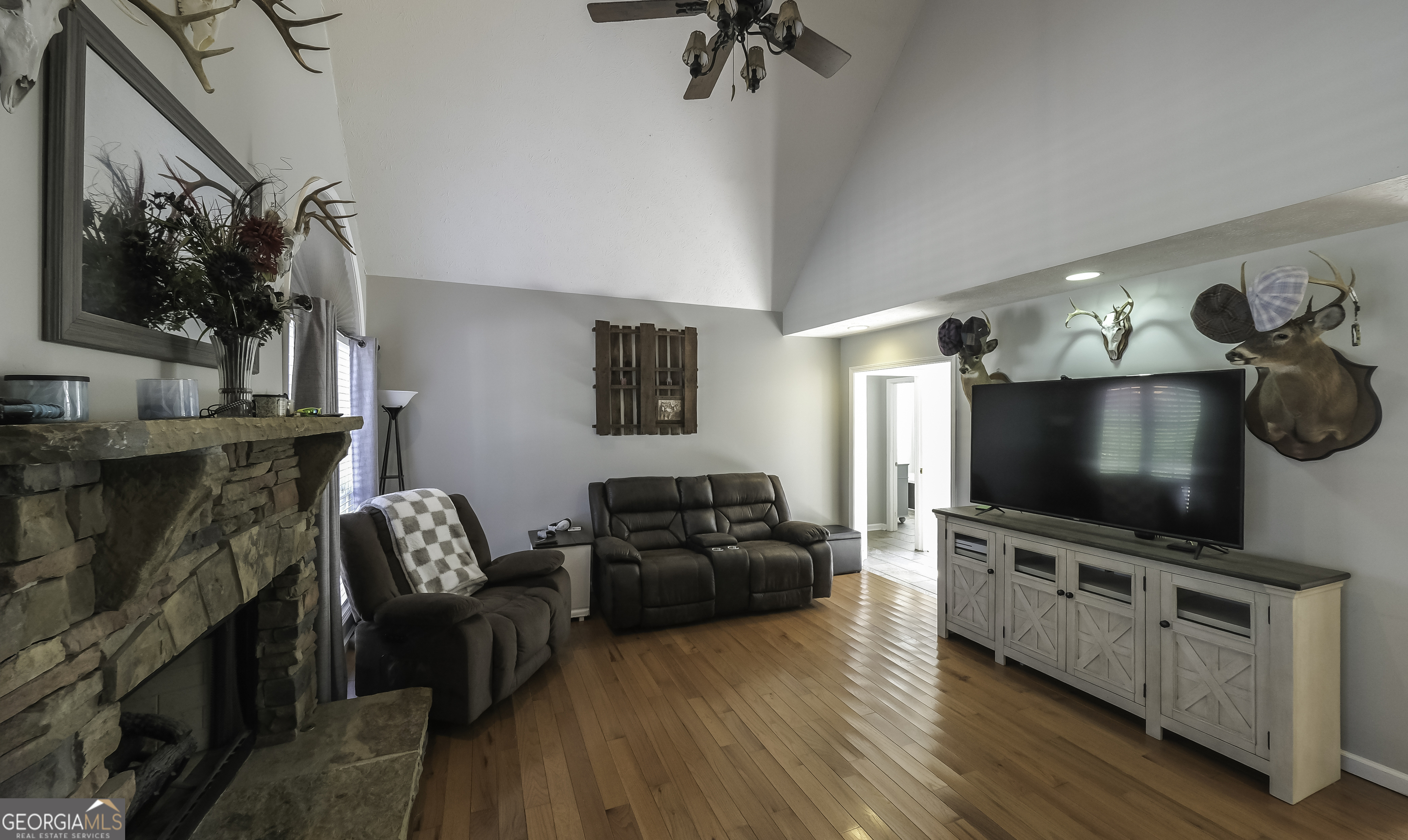 1001 Vong Street Waco, GA 30182 - Photo 11 of 45 a living room with furniture and a flat screen tv