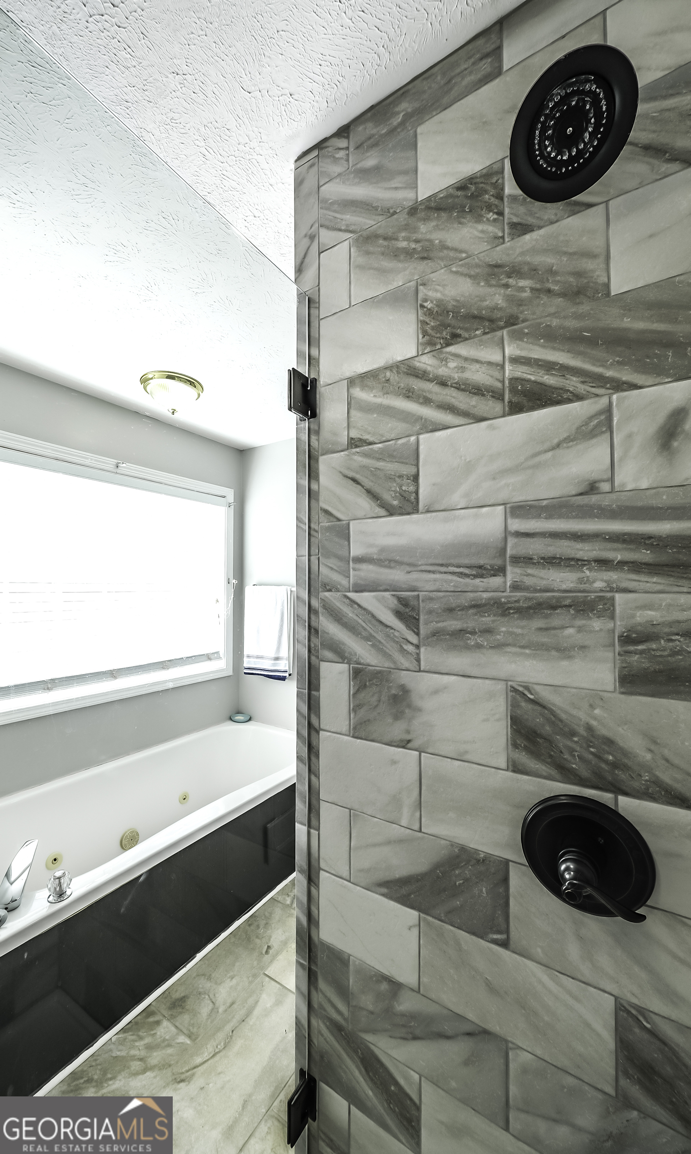 1001 Vong Street Waco, GA 30182 - Photo 15 of 45 a bathroom with a bathtub and a sink