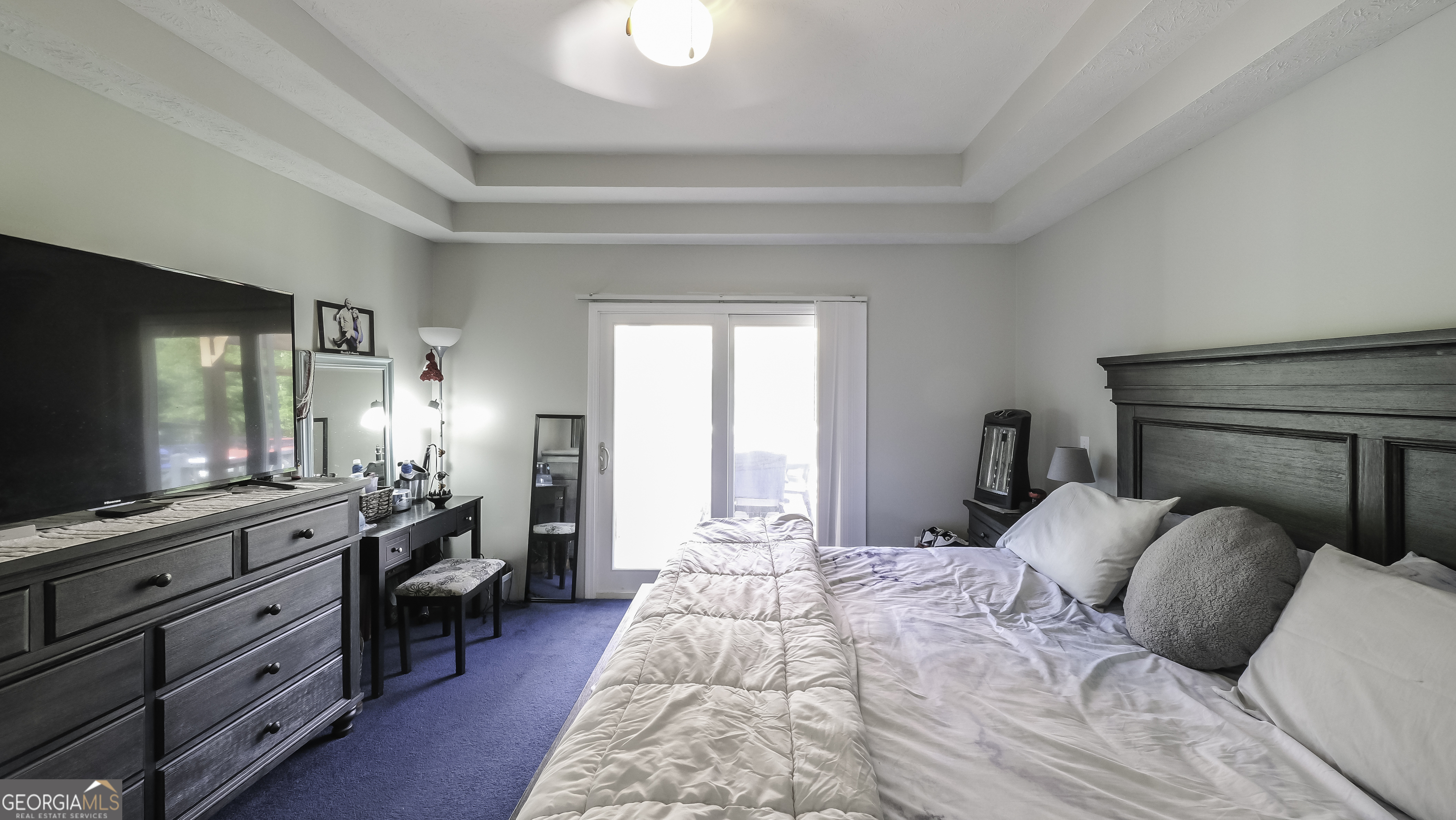 1001 Vong Street Waco, GA 30182 - Photo 18 of 45 a bedroom with a bed and a flat screen tv