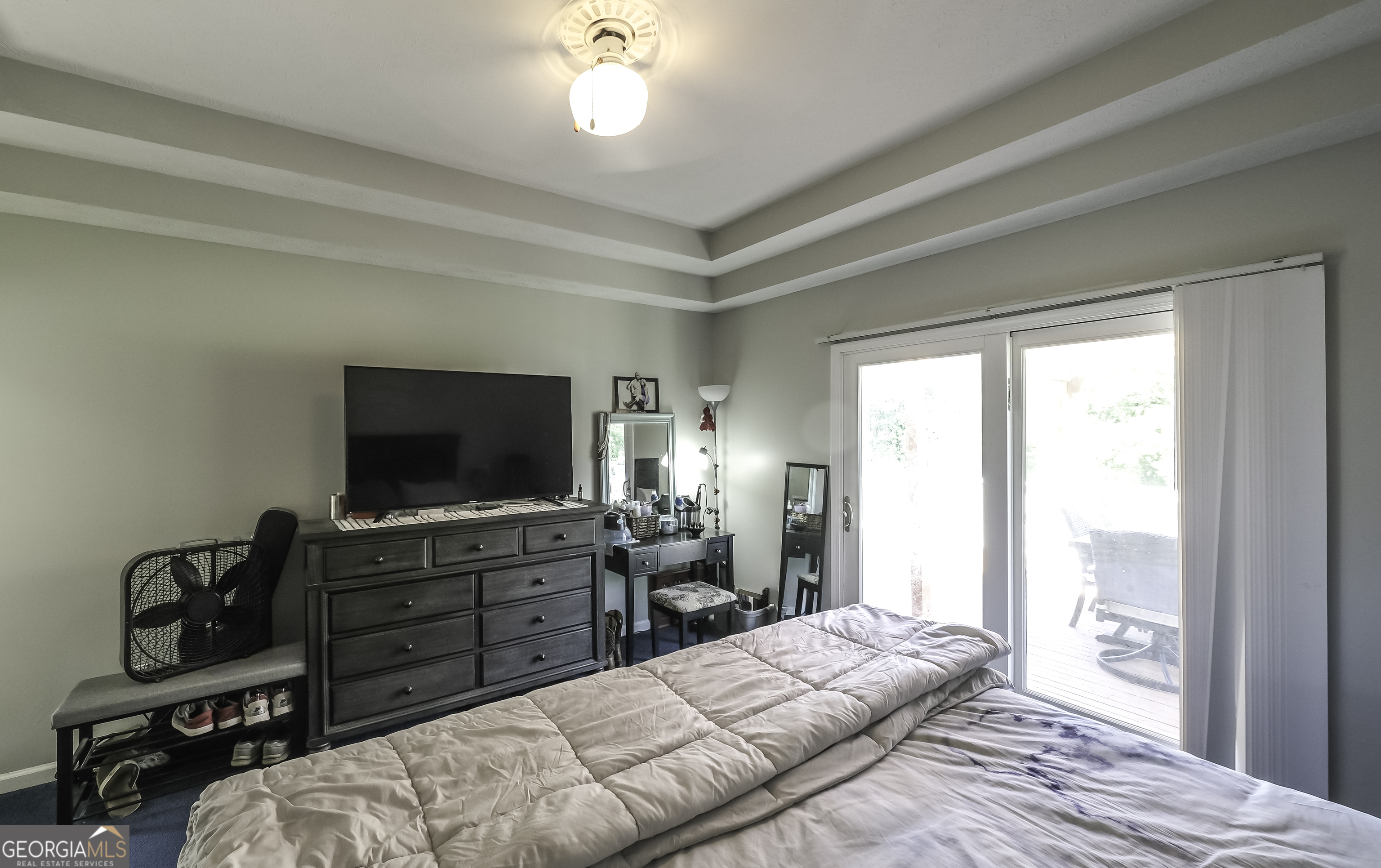 1001 Vong Street Waco, GA 30182 - Photo 19 of 45 a bedroom with a bed and a flat screen tv