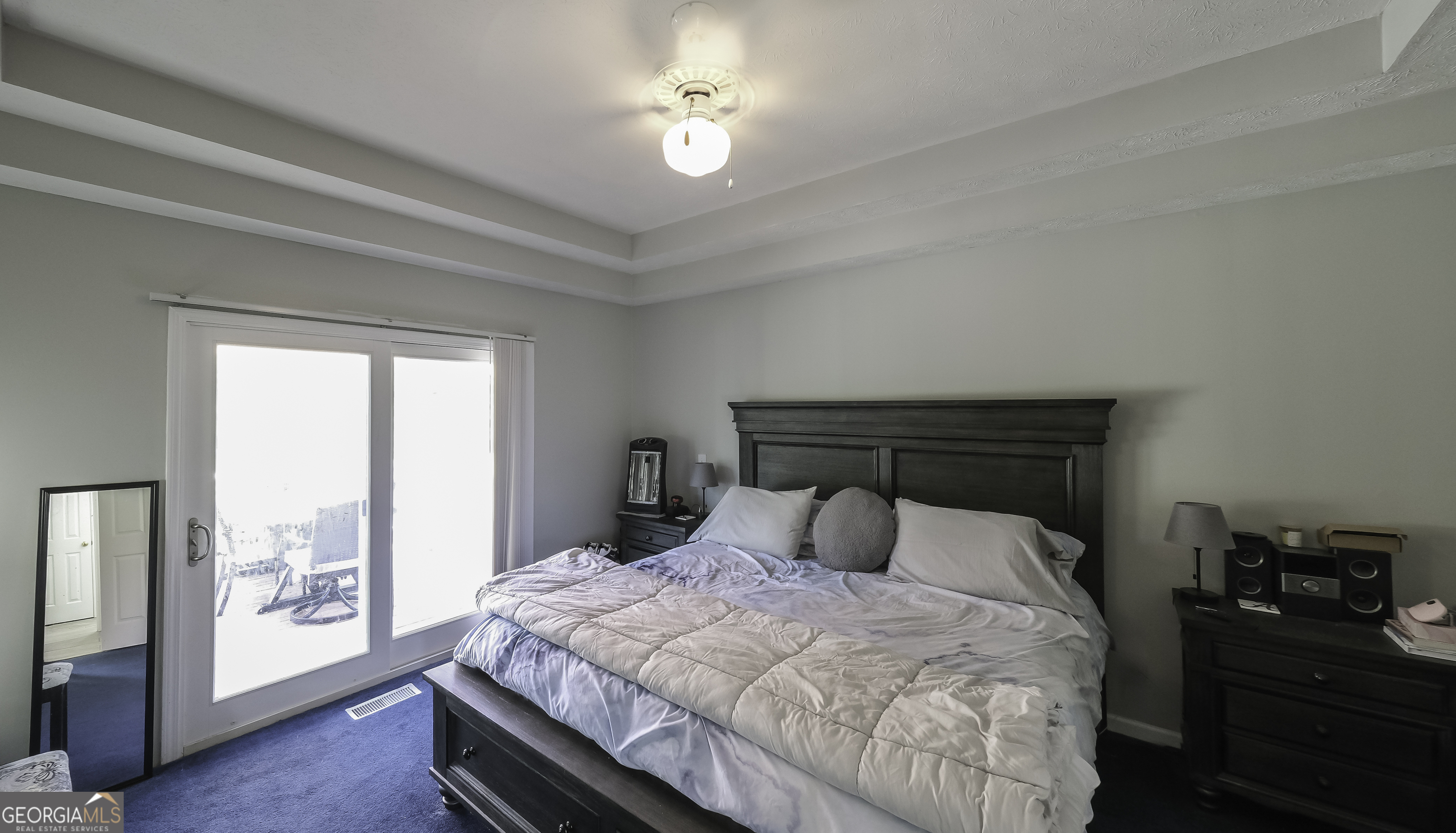 1001 Vong Street Waco, GA 30182 - Photo 20 of 45 a bedroom with a bed and a night stand