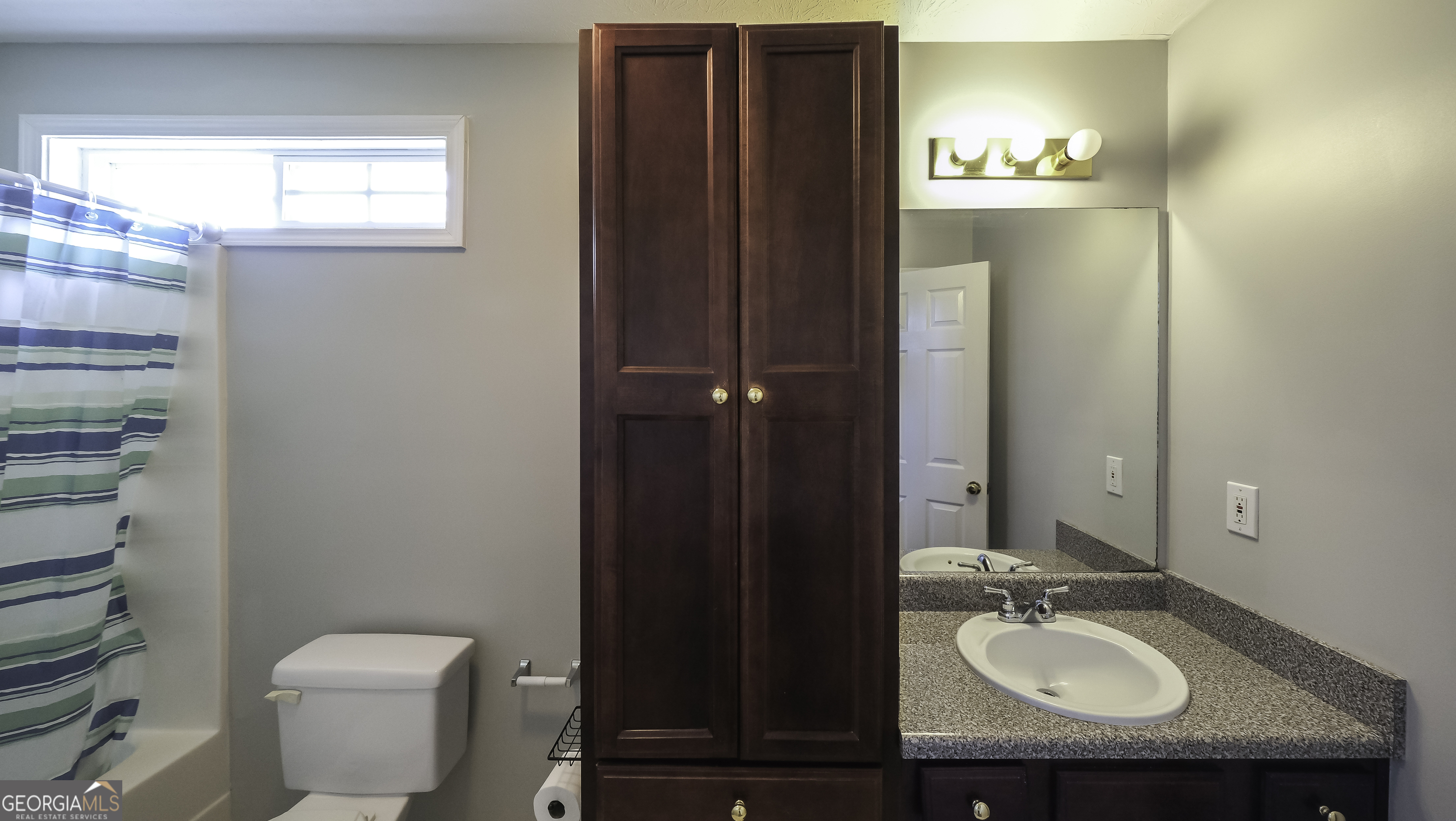 1001 Vong Street Waco, GA 30182 - Photo 31 of 45 a bathroom with a sink a toilet and shower