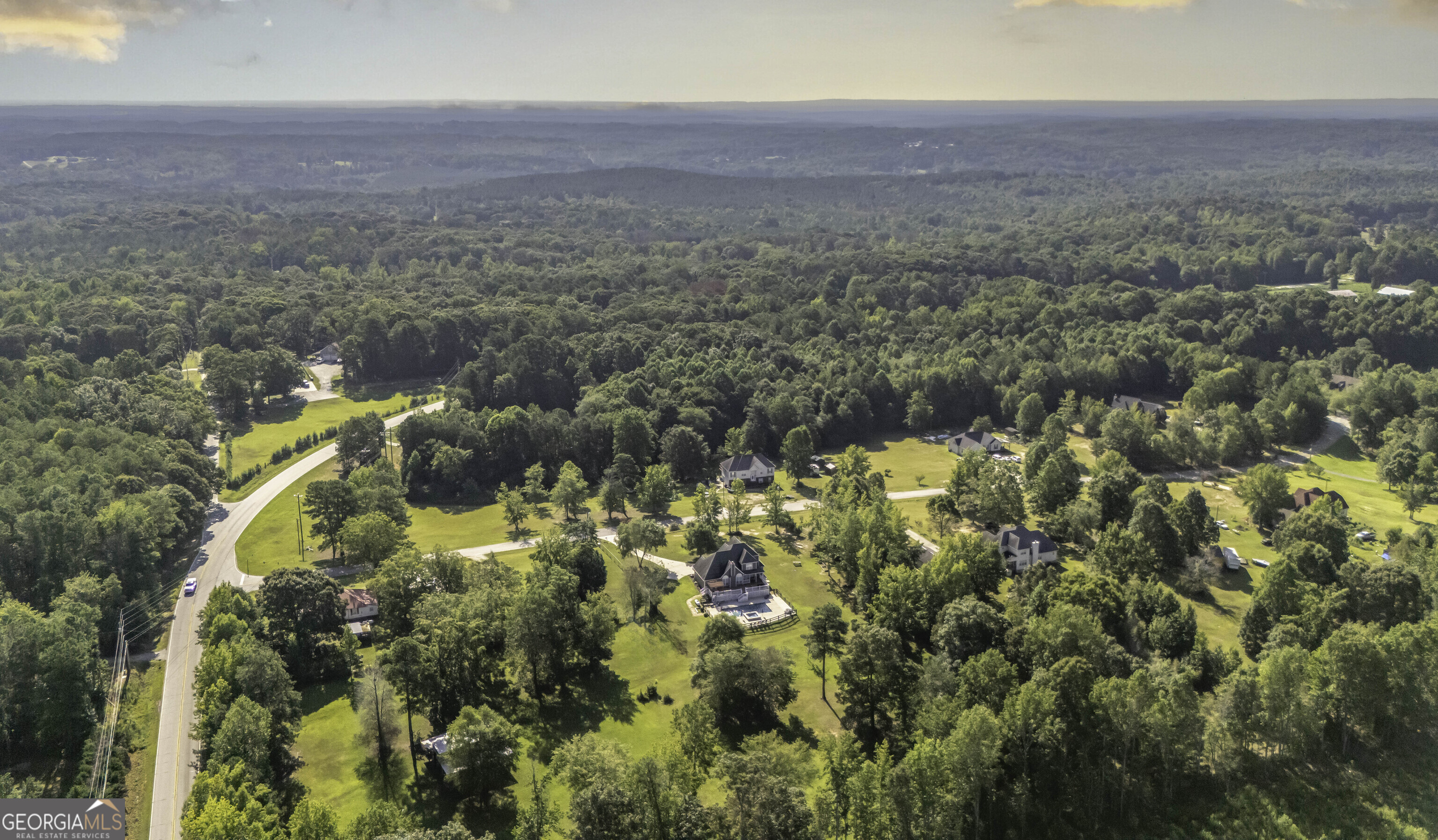 1001 Vong Street Waco, GA 30182 - Photo 36 of 45 a view of a lake in middle of the forest
