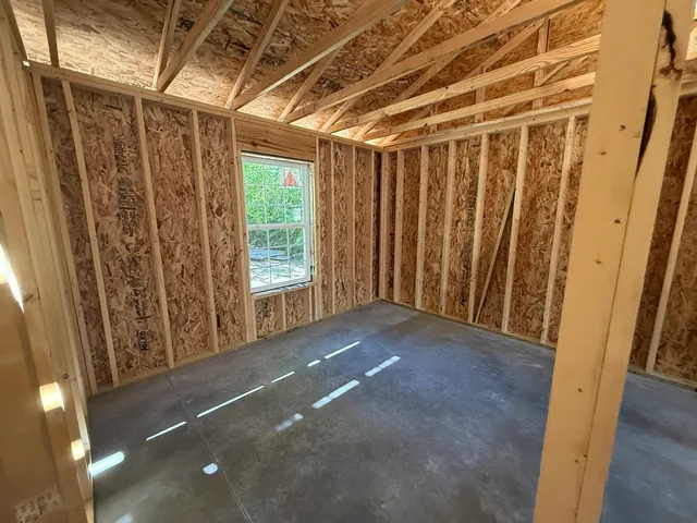 a view of a sign in front of house