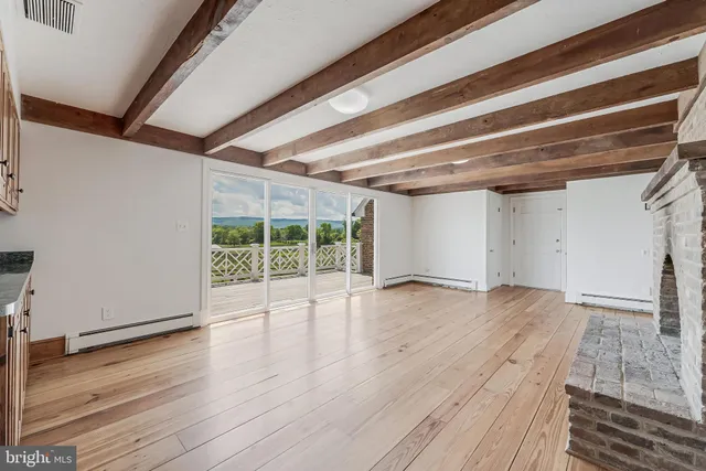 a kitchen with sink cabinets and window