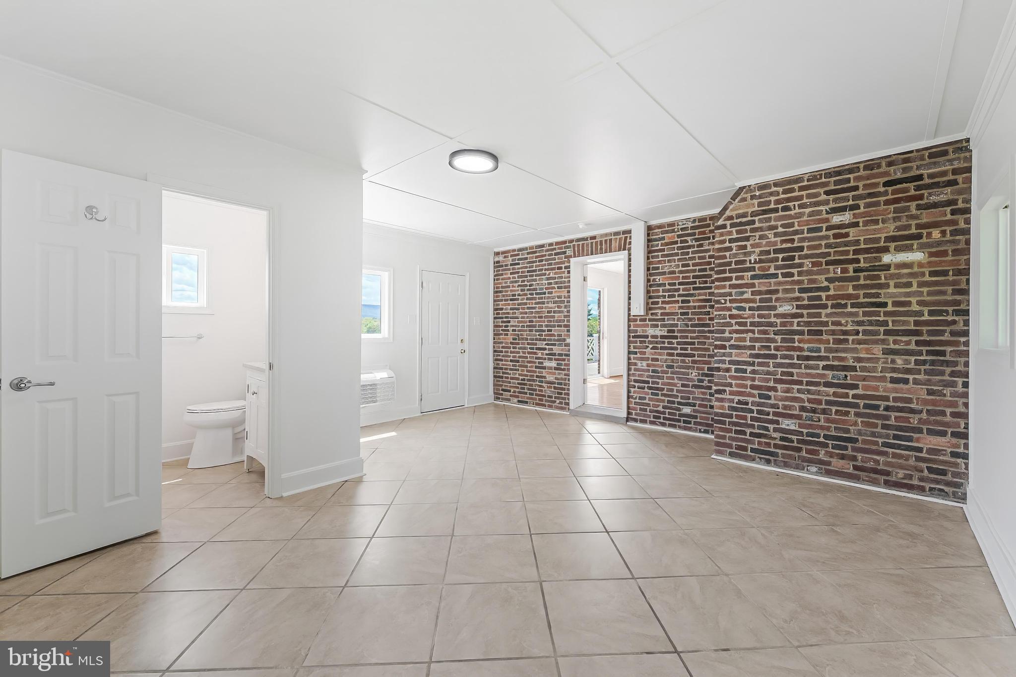 367 Kennel Road Boyce, VA 22620 - Photo 23 of 88 Finished space off living room with full bath