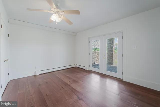 an aerial view of ocean residential houses with outdoor space and swimming pool