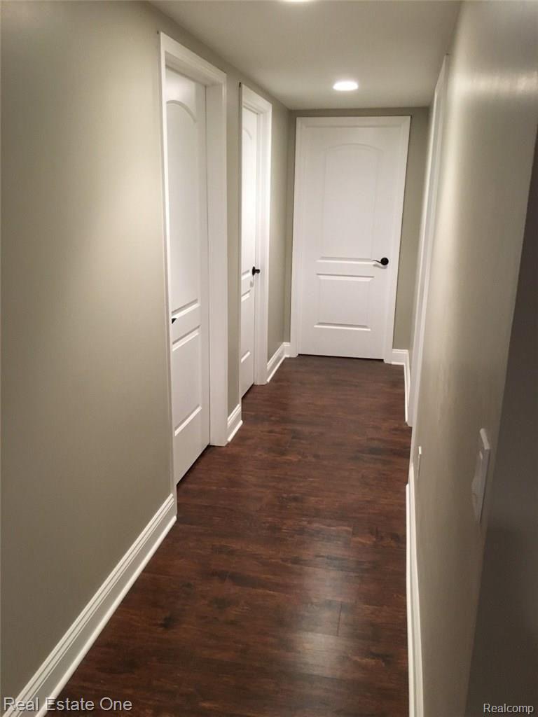 1836 Jason Circle Rochester, MI 48306 - Photo 16 of 45 Hallway to (2) separate storage rooms.