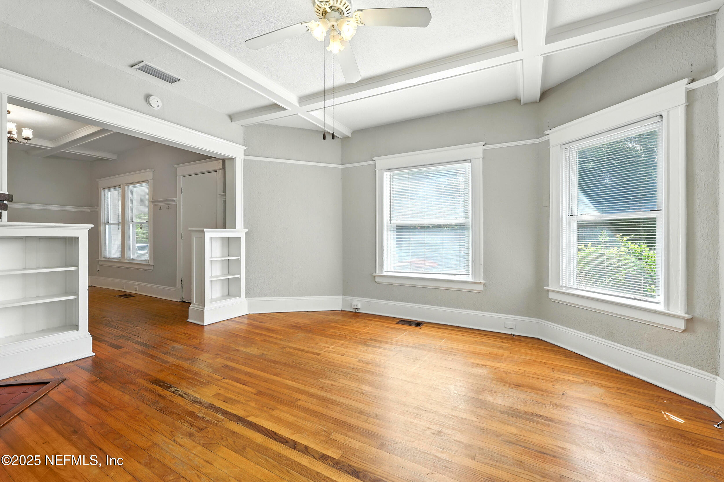 2805 Post Street Jacksonville, FL 32205 - Photo 5 of 23 a view of an empty room with a window and wooden floor