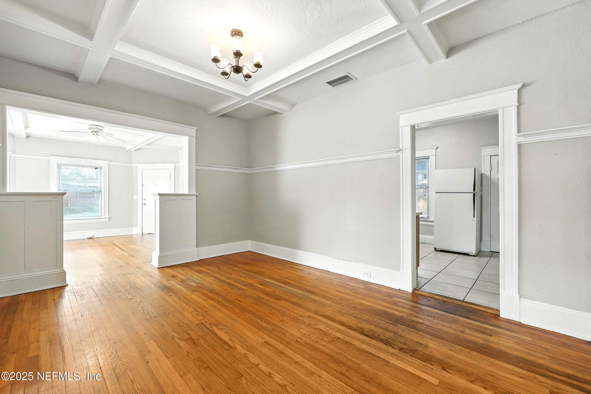 2805 Post Street Jacksonville, FL 32205 - Photo 8 of 23 wooden floor in an empty room with a window