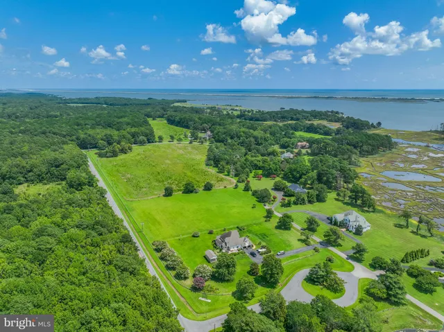 a view of a field with an outdoor space