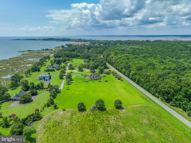 a view of a pool with a yard