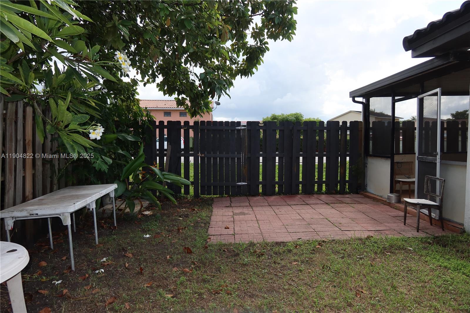 12059 Southwest 10th Street, Unit 201 Miami, FL 33184 - Photo 16 of 17 a view of an outdoor space with seating area