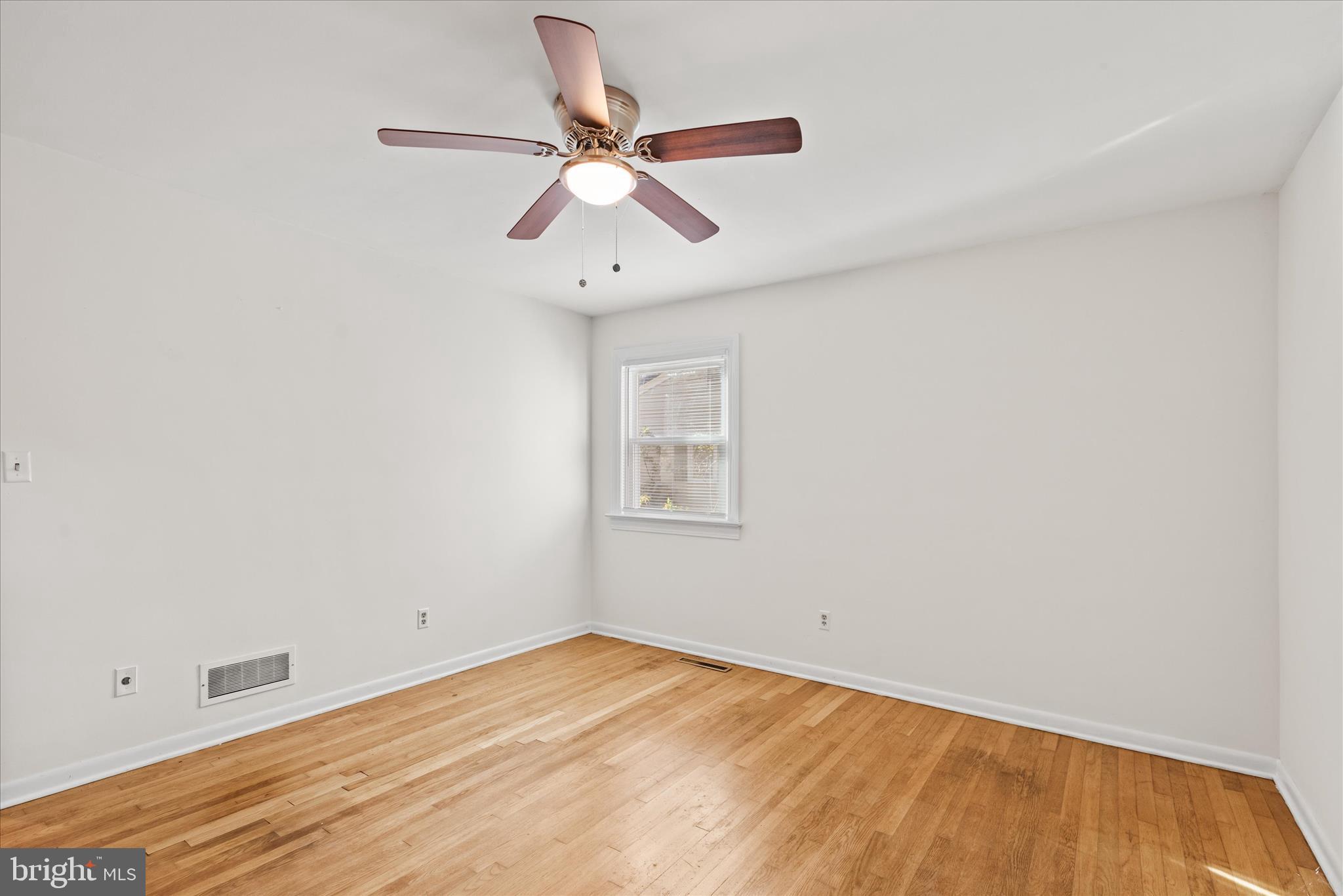 625 Pine Bluff Road Salisbury, MD 21801 - Photo 25 of 37 wooden floor in an empty room
