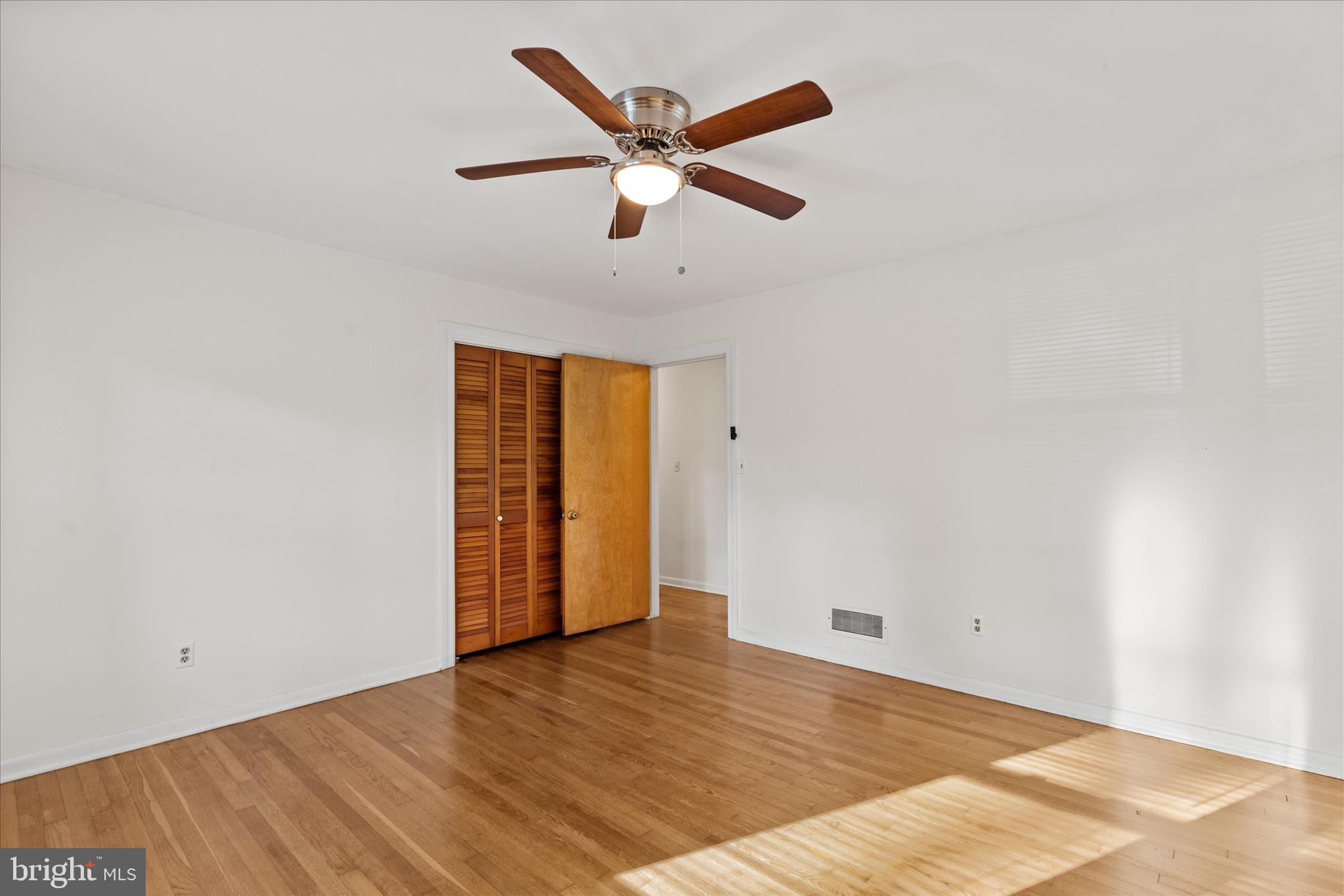 625 Pine Bluff Road Salisbury, MD 21801 - Photo 30 of 37 a view of an empty room with wooden floor