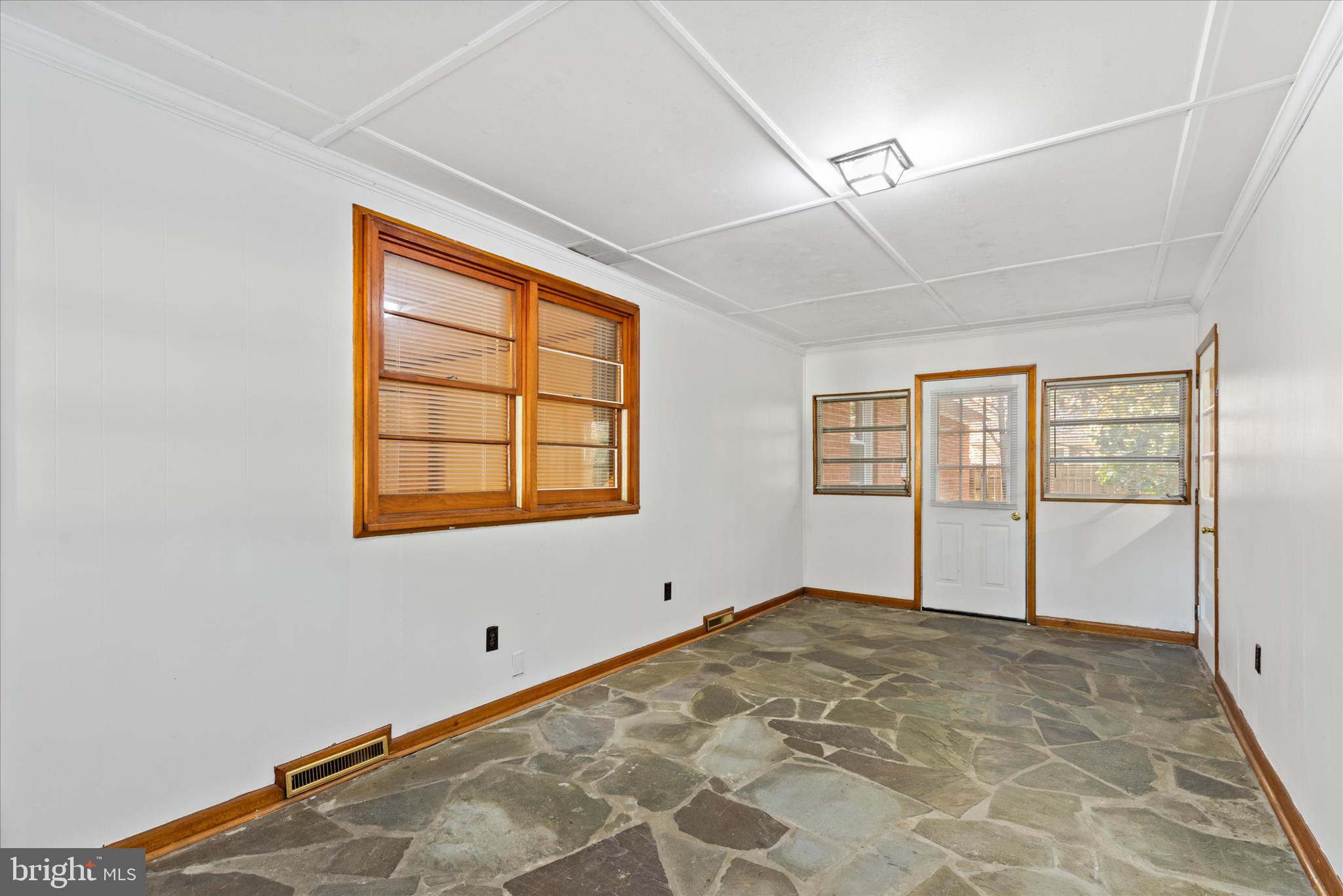 625 Pine Bluff Road Salisbury, MD 21801 - Photo 33 of 37 a view of an empty room with window and wooden floor