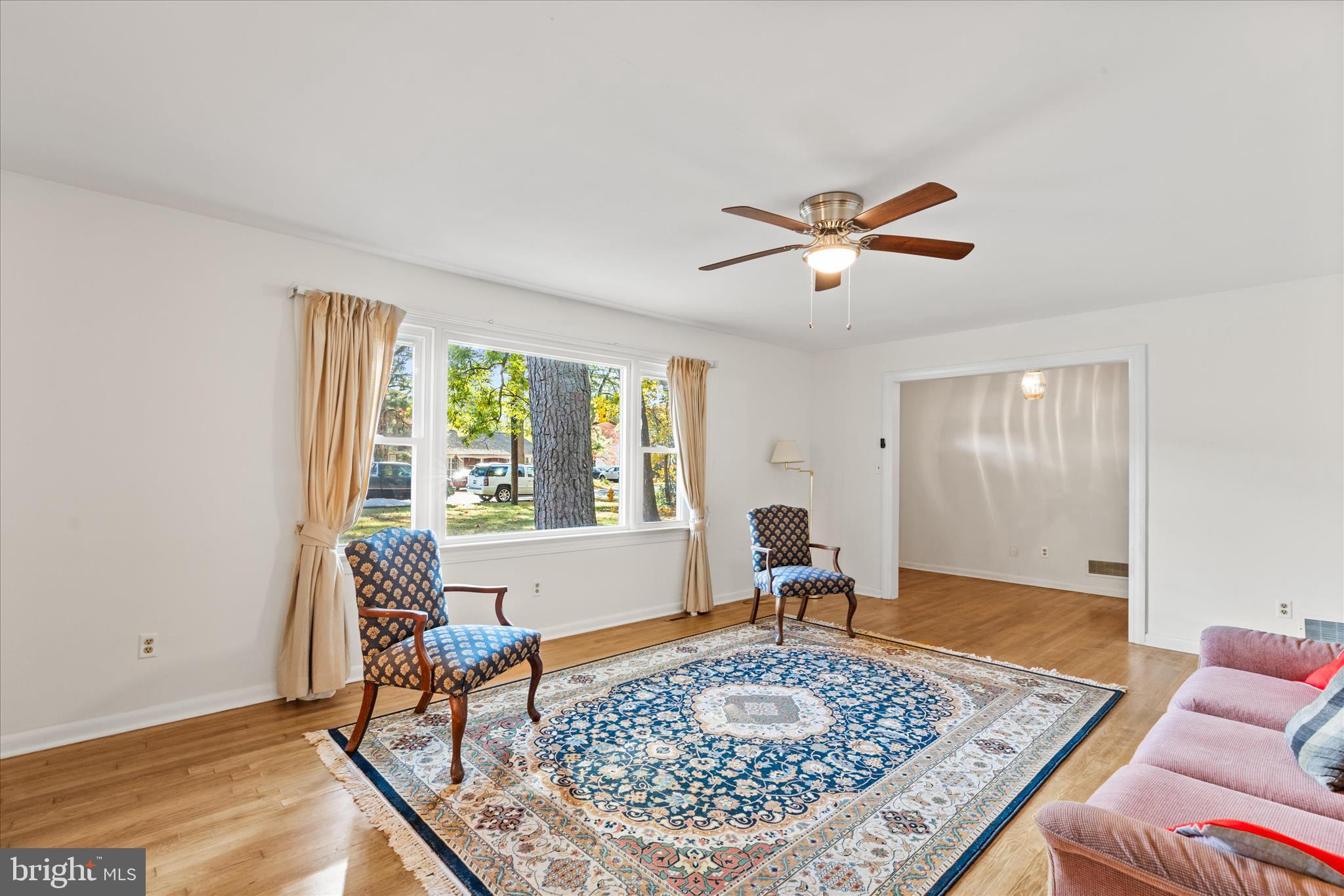 625 Pine Bluff Road Salisbury, MD 21801 - Photo 8 of 37 a living room with furniture and a rug